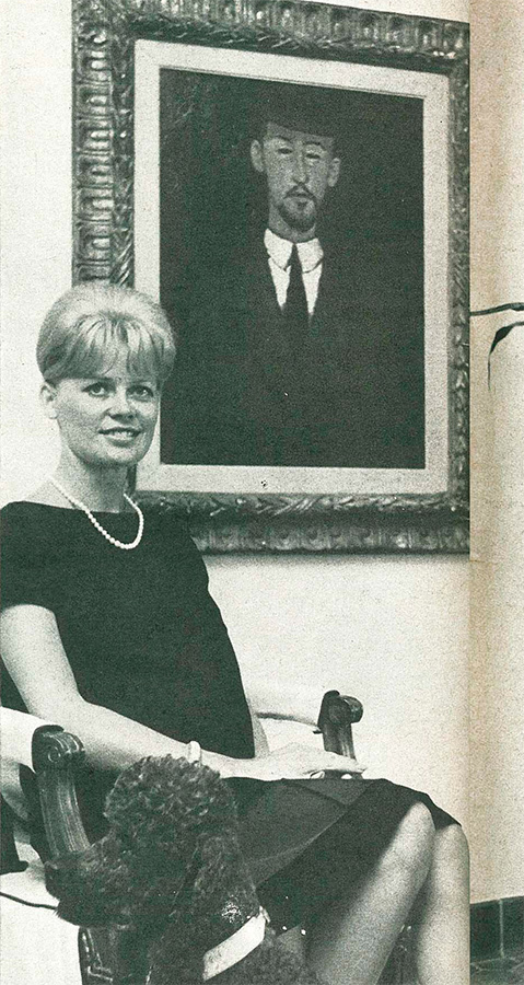 sellin wife with the painting framed